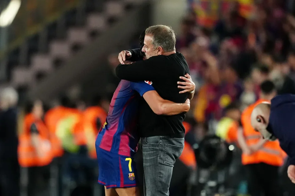 Ferran Torres y Hansi Flick.